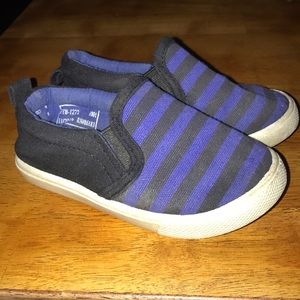 Black and blue striped canvas shoes